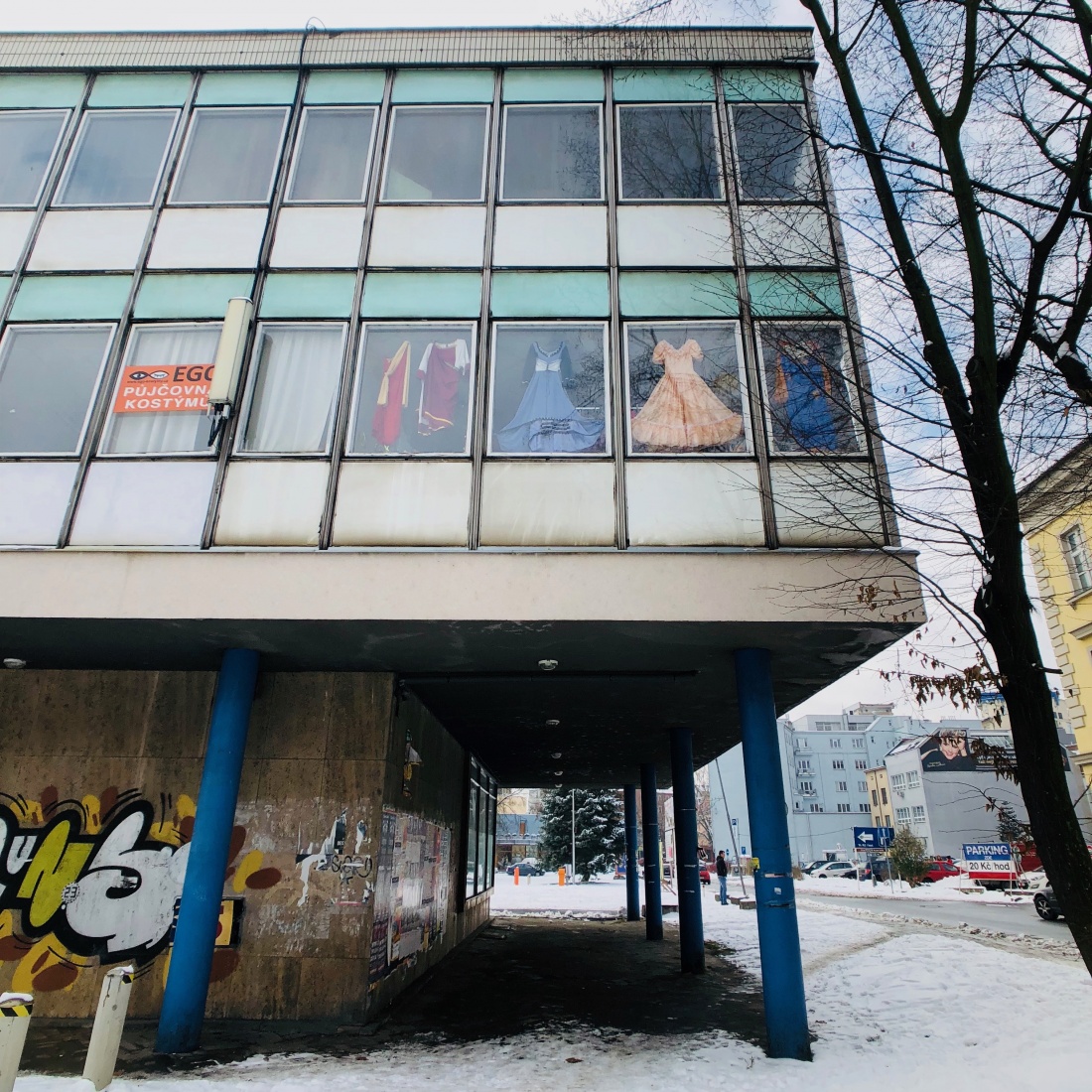 Faded dresses in the window of a Communist-era building in Ostrava, Czech Republic.
