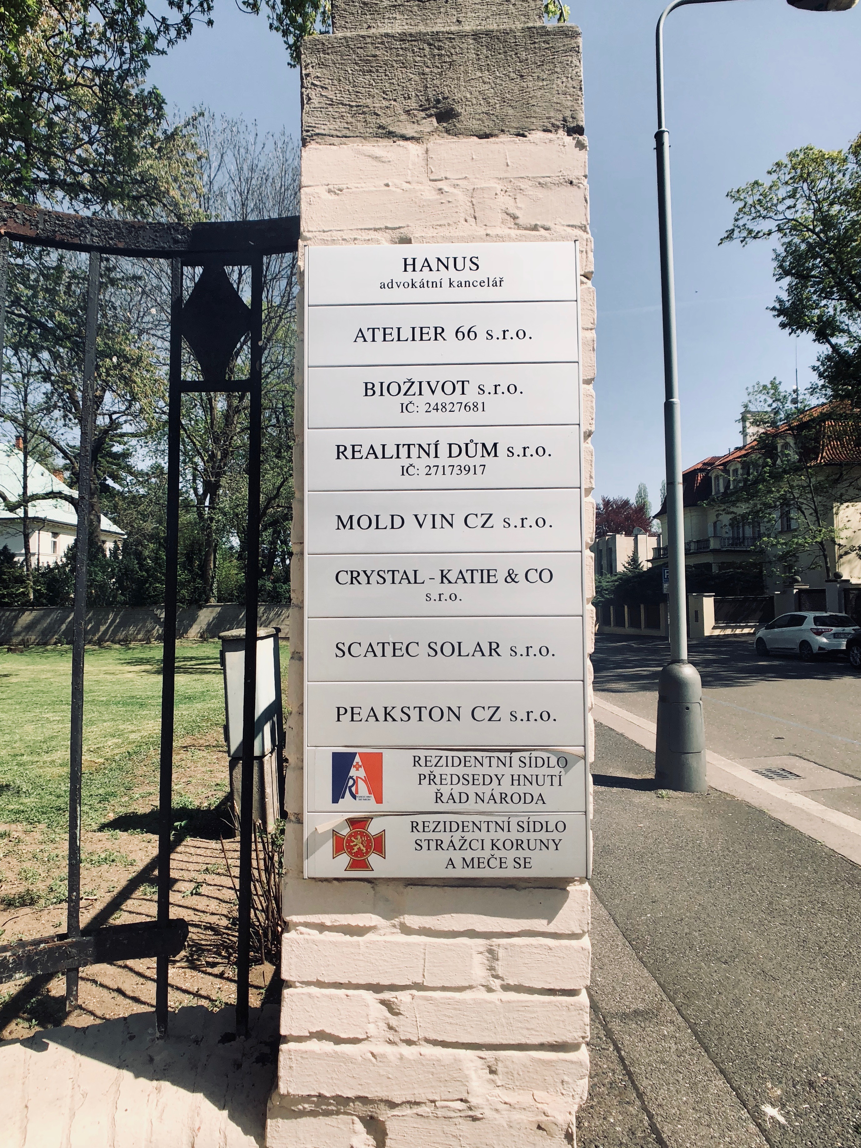 A list of companies in front of a villa at Na Zátorce 9 in Bubenec, Prague.